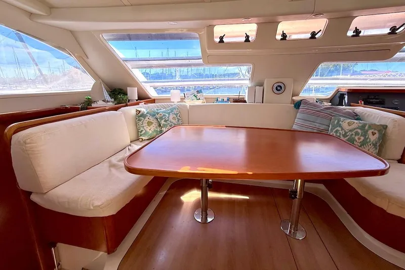 Slide: The Image of Luxurious Leopard 46 yacht interior with elegant seating and wooden table, 2010 model. - 49