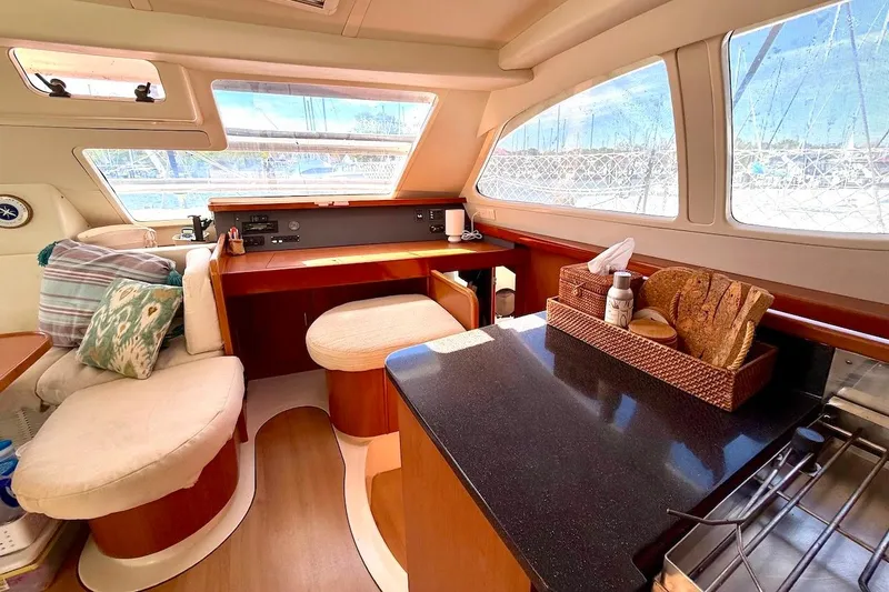 Slide: The Image of Luxurious interior of a 2010 Leopard 46 yacht with cozy seating and modern amenities. - 54