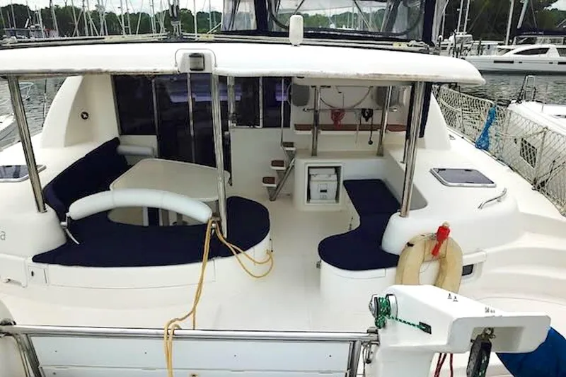 Slide: The Image of 2010 Leopard 46 yacht cockpit with seating, table, and nautical equipment. - 6