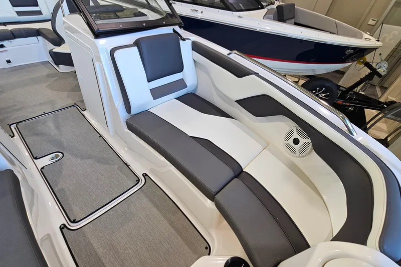 Slide: The Image of 2022 Yamaha Boats SX210 interior with sleek seating and modern design. - 16