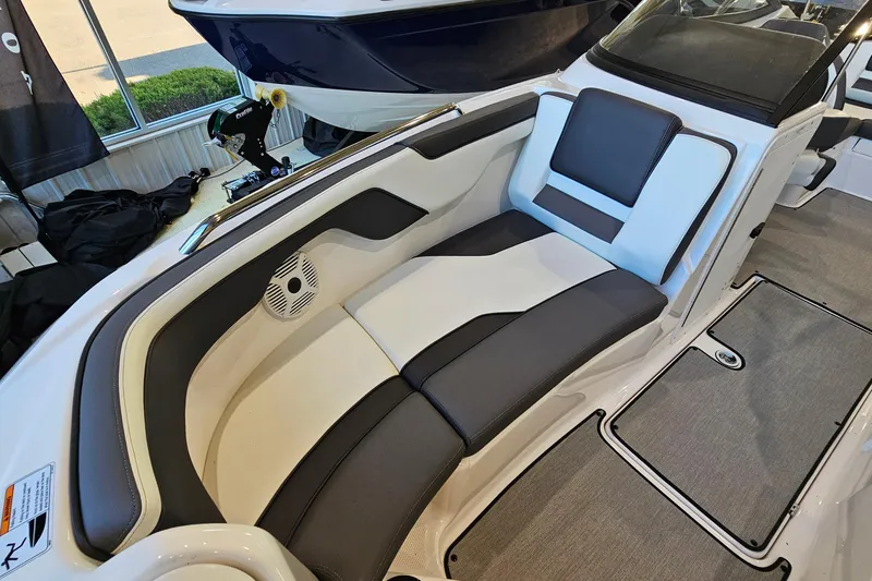 Slide: The Image of 2022 Yamaha Boats SX210 interior with sleek seating and modern design. - 17