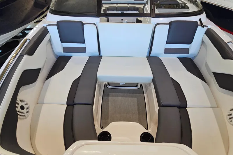 Slide: The Image of 2022 Yamaha Boats SX210 interior seating with modern design and comfortable upholstery. - 19