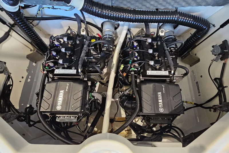 Slide: The Image of 2022 Yamaha Boats SX210 engine compartment showcasing dual Yamaha TR-1 engines. - 23