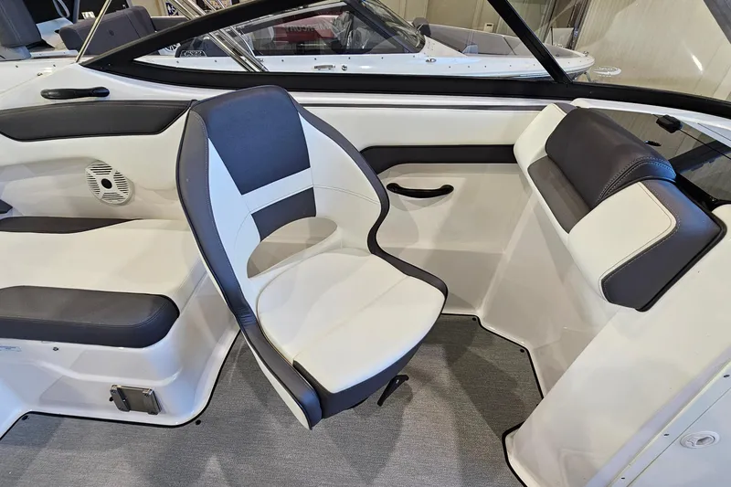 Slide: The Image of Interior seating of a 2022 Yamaha Boats SX210, featuring modern design and comfortable upholstery. - 9