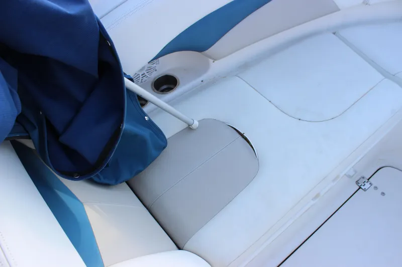 Slide: The Image of Interior seating of 2007 Chaparral 276 SSX boat with blue and white upholstery. - 14