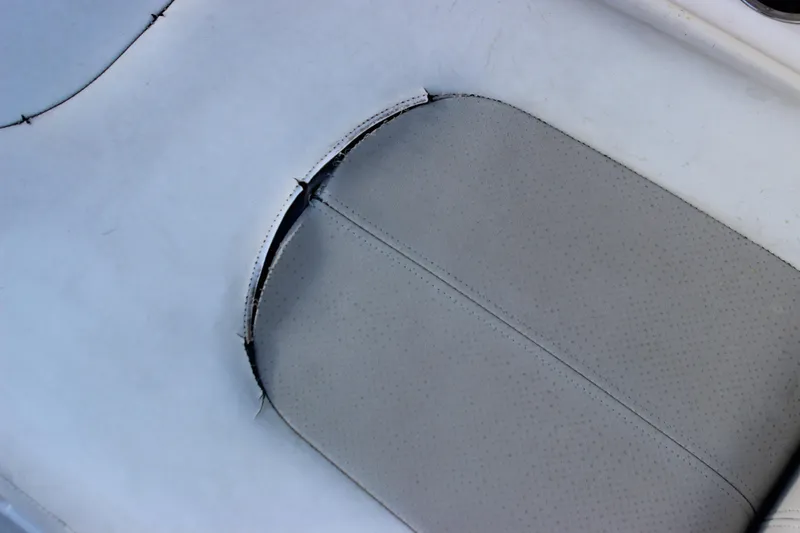 Slide: The Image of Torn seat upholstery on a 2007 Chaparral 276 SSX boat. - 16