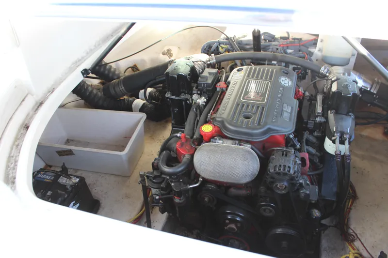 Slide: The Image of Engine compartment of a 2007 Chaparral 276 SSX boat, showcasing detailed mechanical components. - 21