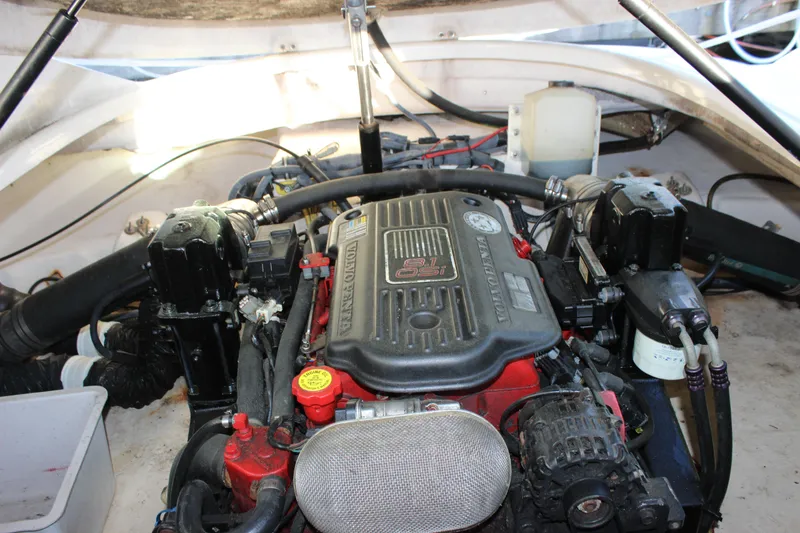 Slide: The Image of Engine compartment of a 2007 Chaparral 276 SSX boat, featuring a Volvo Penta engine. - 22