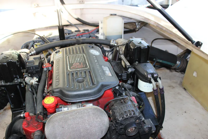 Slide: The Image of Engine compartment of a 2007 Chaparral 276 SSX boat, featuring a 8.1 OSI engine. - 24