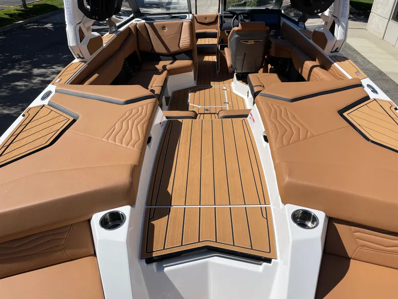 Slide: The Image of 2025 Nautique G23 interior with luxurious leather seating. - 4