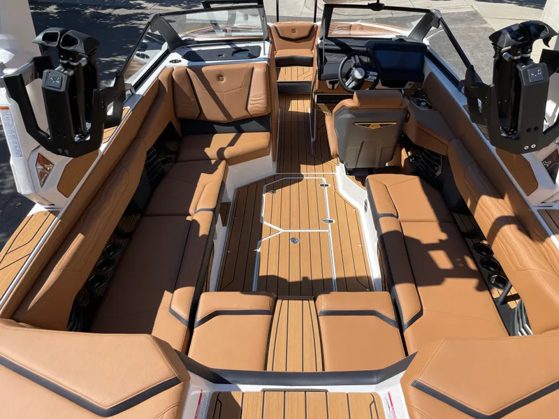 Slide: The Image of Interior of 2025 Nautique G23 with luxurious leather seating. - 5