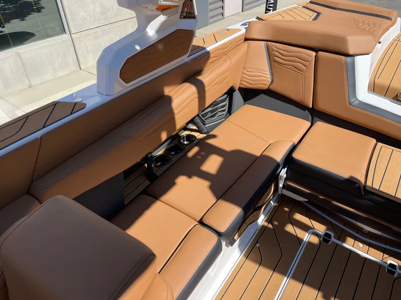Slide: The Image of Interior of 2025 Nautique G23 with luxurious leather seating. - 7