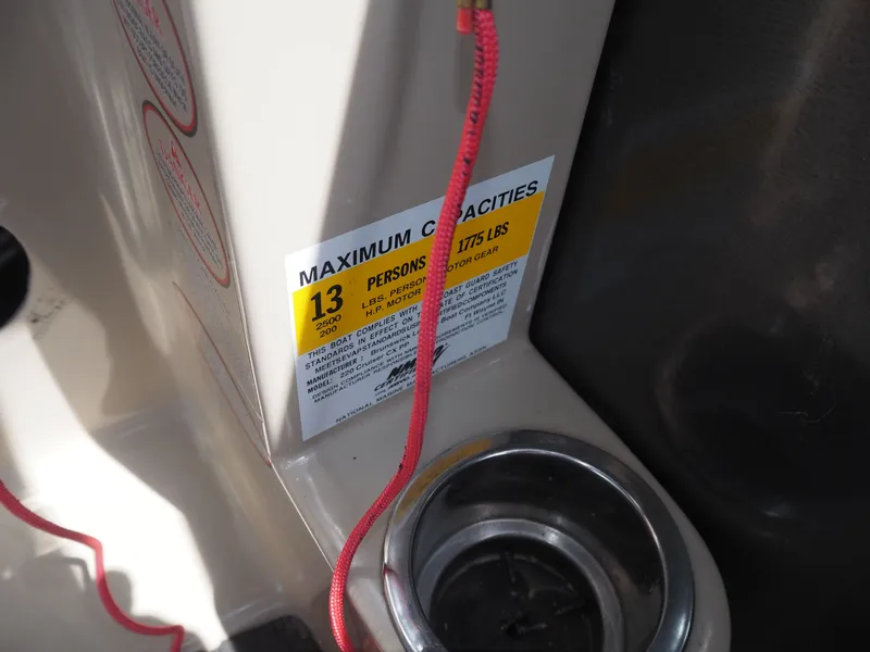 Slide: The Image of Harris CX 220 boat capacity label, 13 persons, 1775 lbs, year 2013. - 8