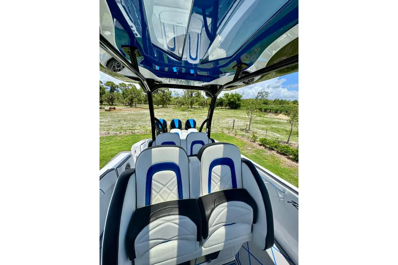 Slide: The Image of 2024 Renegade 38 Open boat interior with sleek seating and modern design. - 26