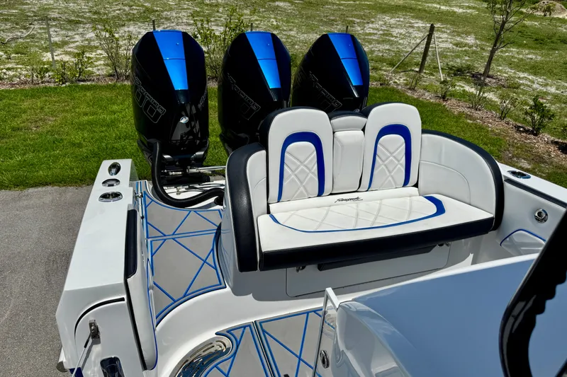 Slide: The Image of 2024 Renegade 38 Open boat with triple engines and stylish seating. - 35