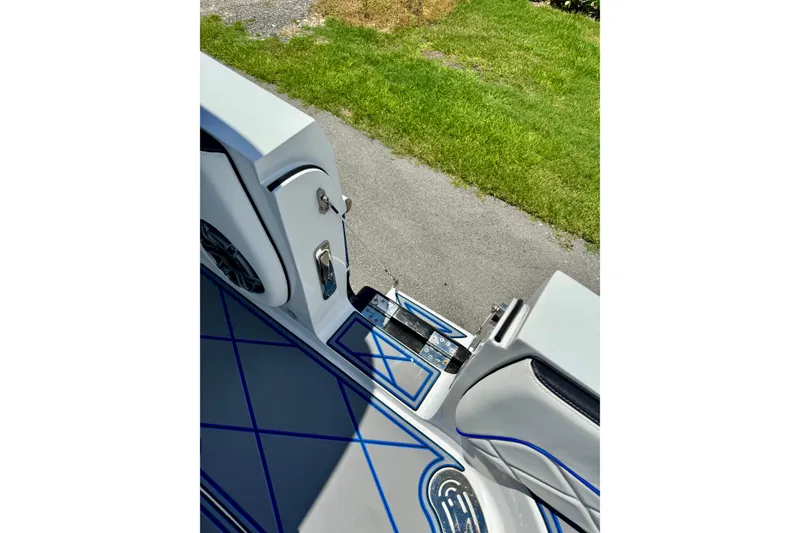 Slide: The Image of 2024 Renegade 38 Open boat interior with sleek design and blue accents. - 36