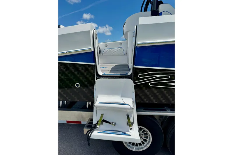 Slide: The Image of 2024 Renegade 38 Open boat with sleek design and modern features, viewed from the rear. - 37