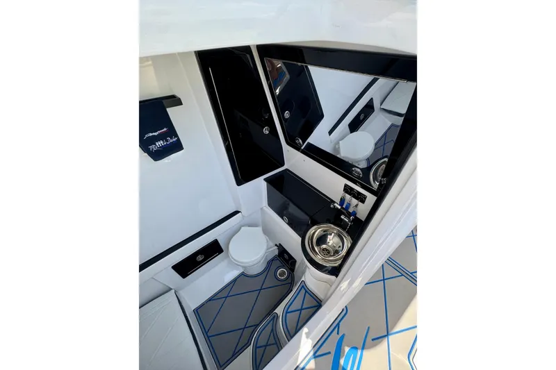 Slide: The Image of Luxurious interior of 2024 Renegade 38 Open boat featuring modern amenities and sleek design. - 40