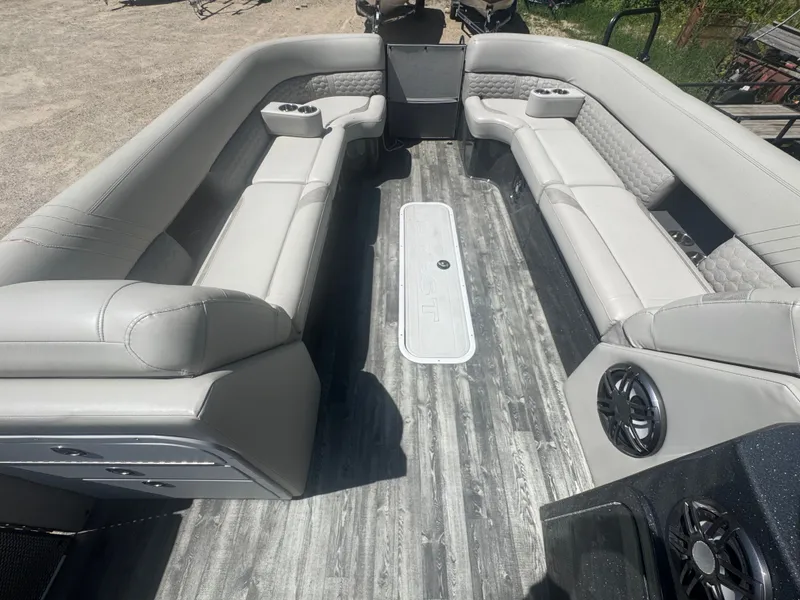 Slide: The Image of Interior of a 2020 Crest Caribbean pontoon boat with gray seating. - 10