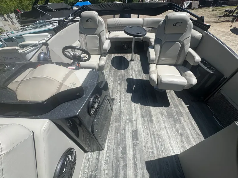Slide: The Image of Interior of a 2020 Crest Caribbean pontoon boat with luxurious seating. - 12