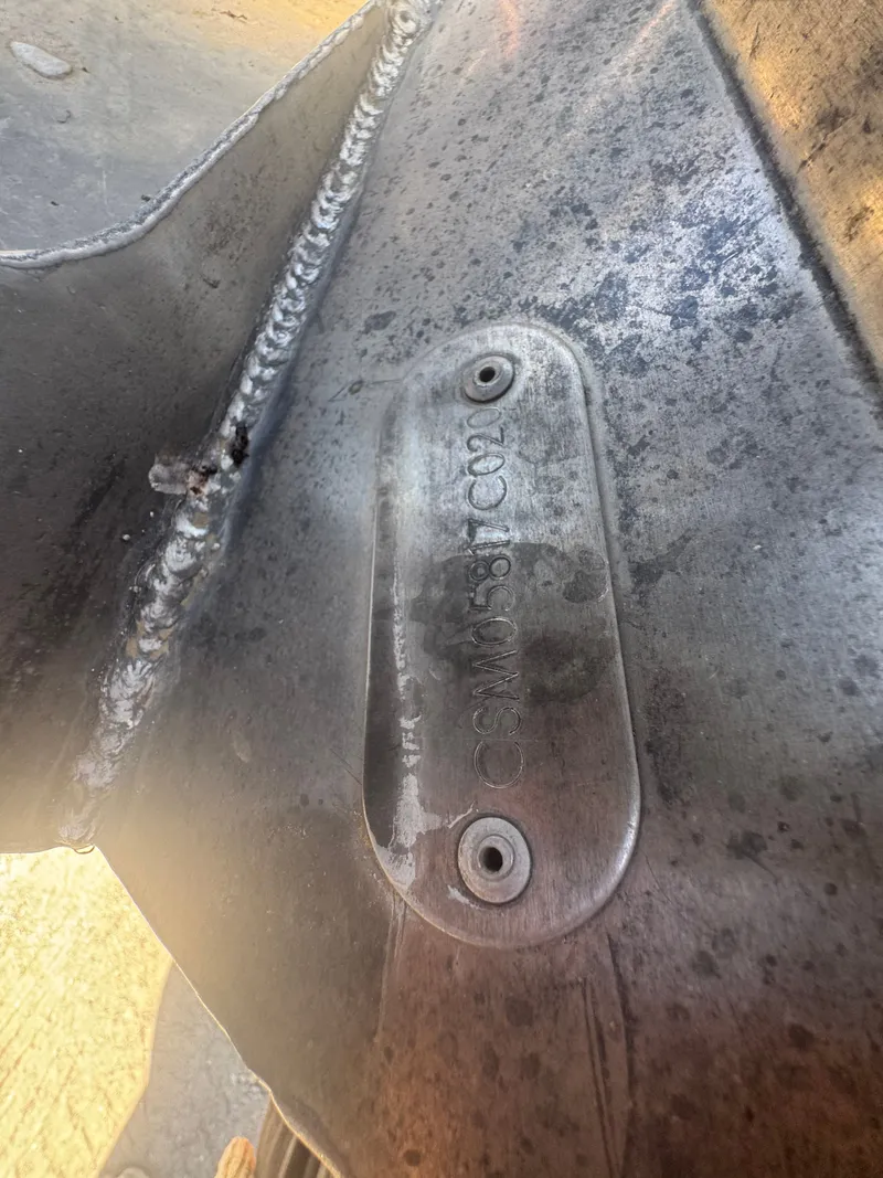 Slide: The Image of Close-up of a Crest Caribbean 2020 metal part with engraving. - 17