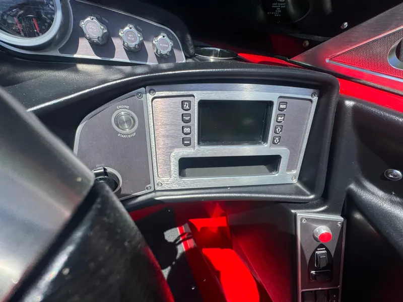 Slide: The Image of Dashboard of a 2017 MasterCraft XT23 boat with controls. - 11