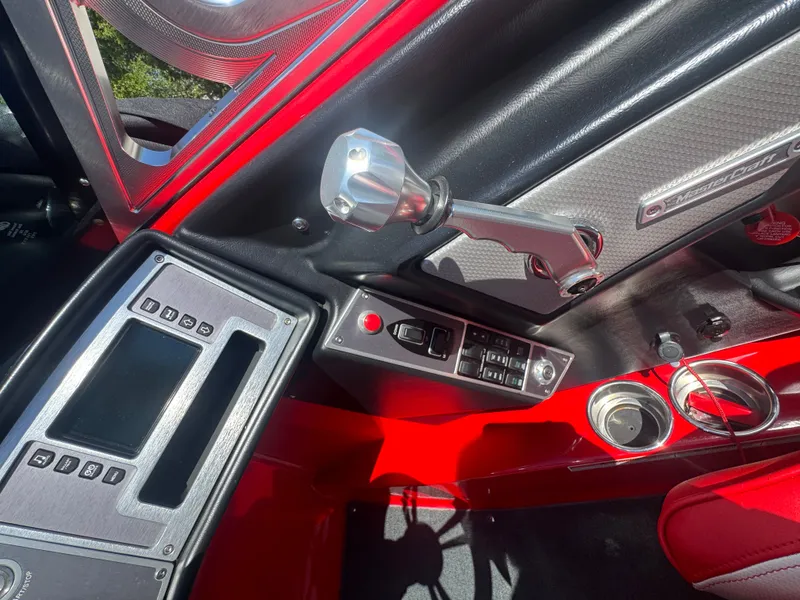 Slide: The Image of Interior of a 2017 MasterCraft XT23 boat with control console. - 12