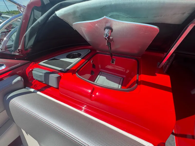 Slide: The Image of Interior view of a 2017 MasterCraft XT23 boat with storage compartment. - 15