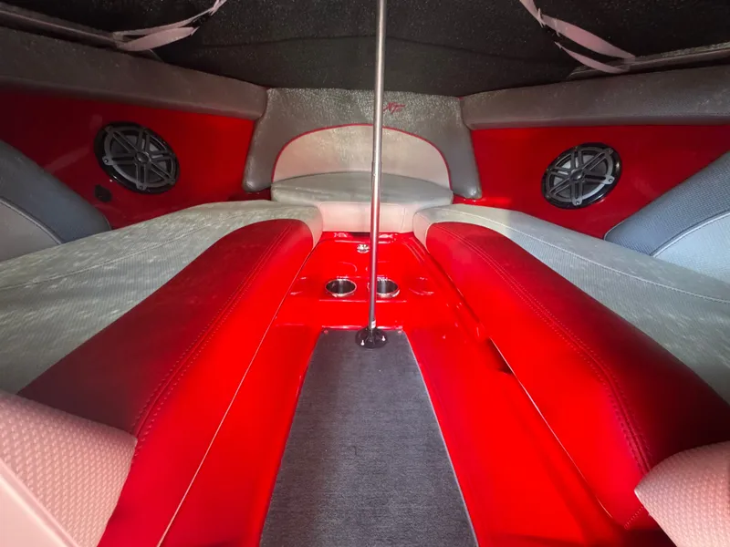 Slide: The Image of Interior of 2017 MasterCraft XT23 with red upholstery and speakers. - 17