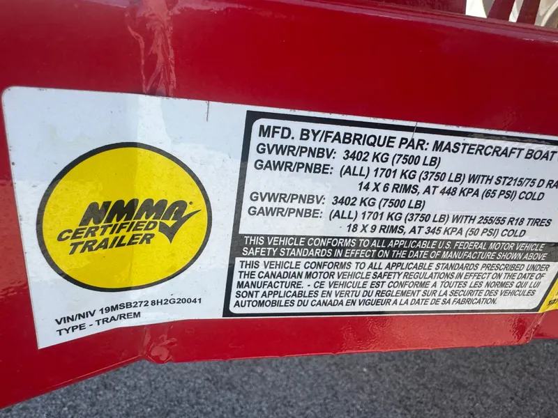 Slide: The Image of MasterCraft XT23 2017 trailer label with NMMA certification. - 23