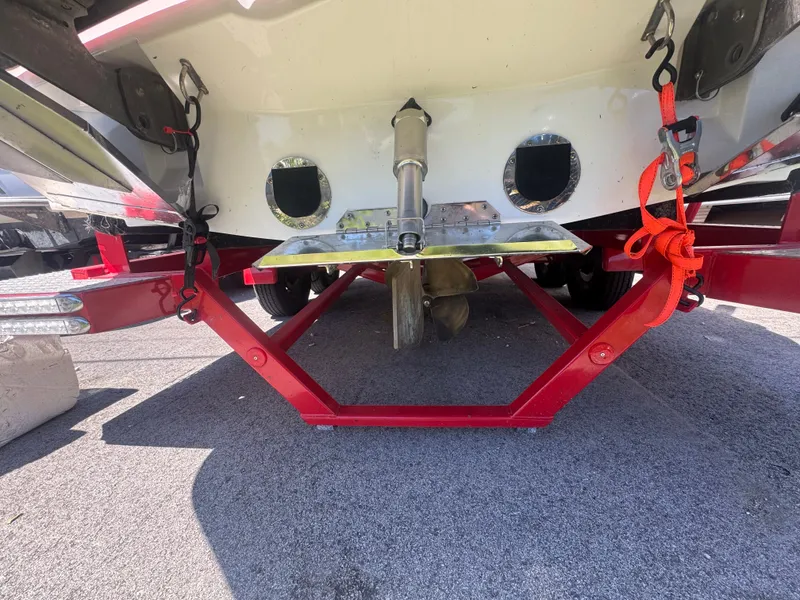 Slide: The Image of Underside of a 2017 MasterCraft XT23 boat on a trailer. - 4