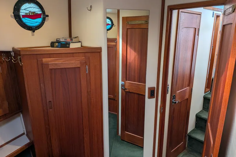 Slide: The Image of Engine room of a 2001 Nordic Tug 37 with generator and fuel filters. - 45