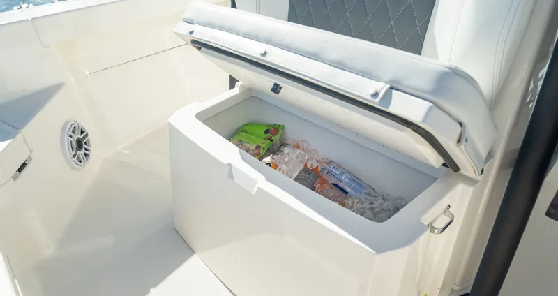 Slide: The Image of Cooler in Pathfinder 2400 TRS boat, filled with drinks and ice. - 11