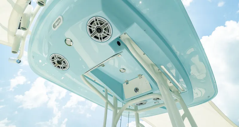 Slide: The Image of Pathfinder 2400 TRS 2027 boat roof with speakers and sky view. - 7