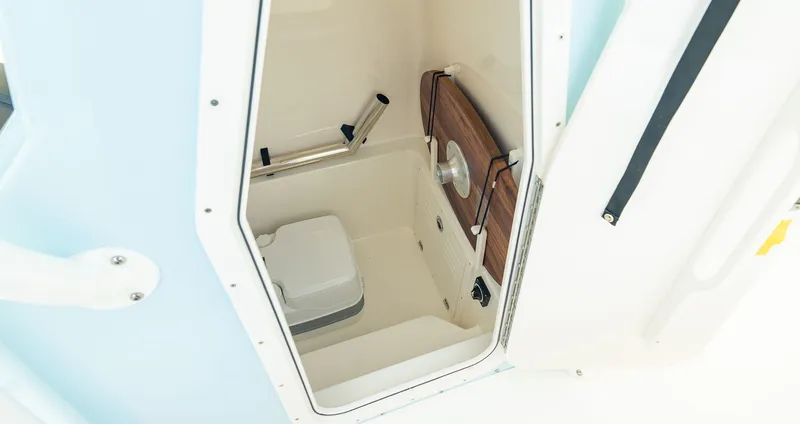 Slide: The Image of Interior of 2027 Pathfinder 2400 TRS with storage and toilet. - 17