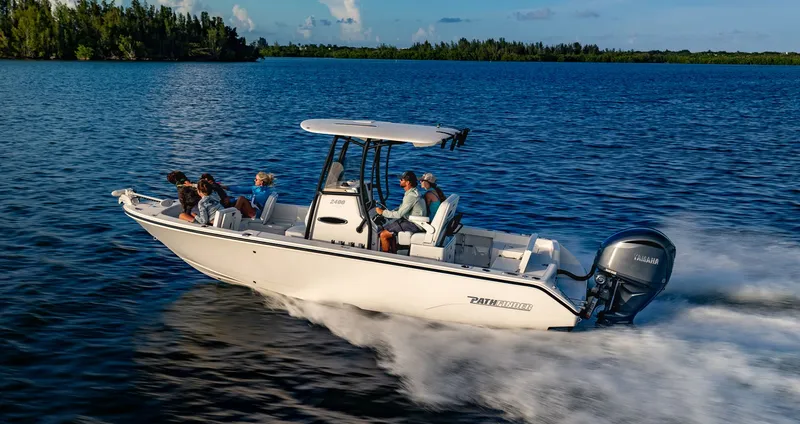 Slide: The Image of Pathfinder 2400 TRS 2027 boat on water with passengers. - 3