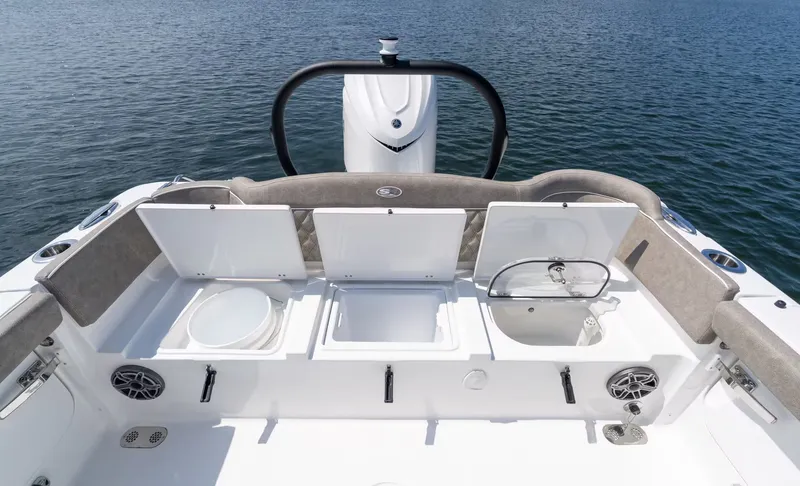 Slide: The Image of Interior view of 2027 Sea Hunt Ultra 255 SE with storage compartments. - 5