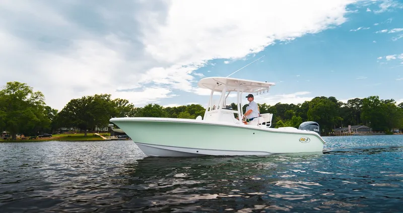 Slide: The Image of Sea Hunt Ultra 219 boat 2027 on calm water. - 4