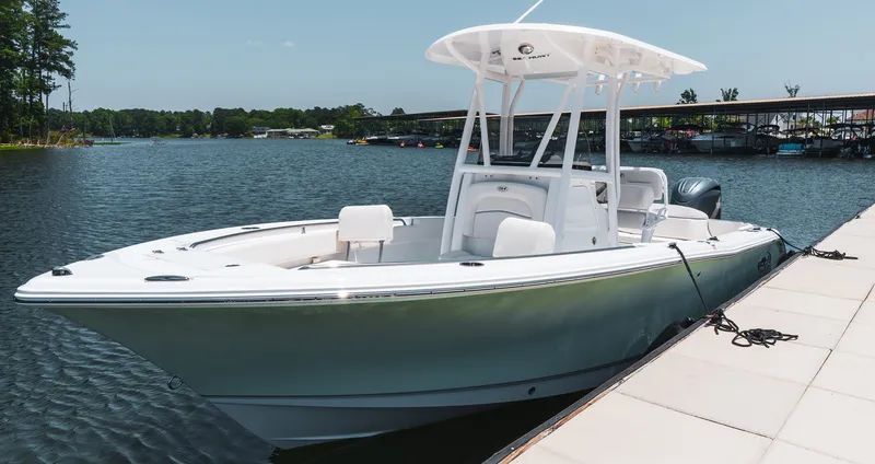 Slide: The Image of Sea Hunt Ultra 219 boat docked, 2027 model. - 8