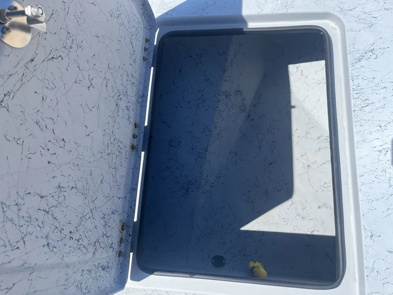 Slide: The Image of Open storage compartment in Freedom PATRIOT 2024 boat. - 15