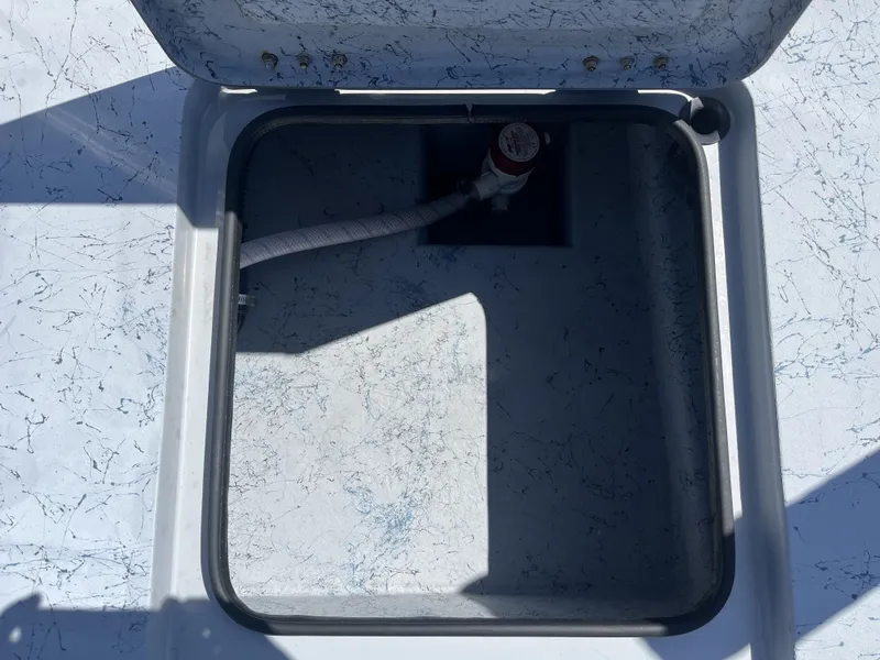 Slide: The Image of Open storage compartment in Freedom PATRIOT 2024 boat. - 25