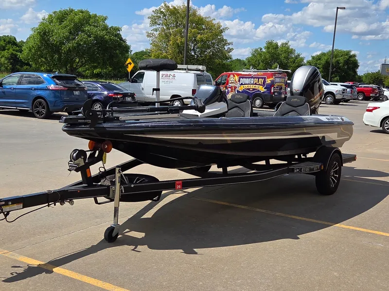 Slide: The Image of 2023 Skeeter ZX 150 boat parked on trailer outdoors. - 4