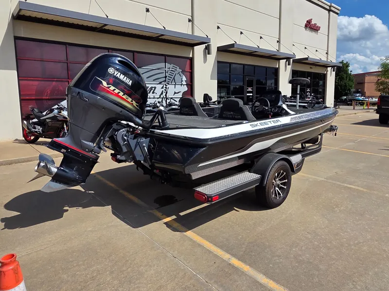 Slide: The Image of 2023 Skeeter ZX 150 boat with Yamaha engine on trailer. - 8