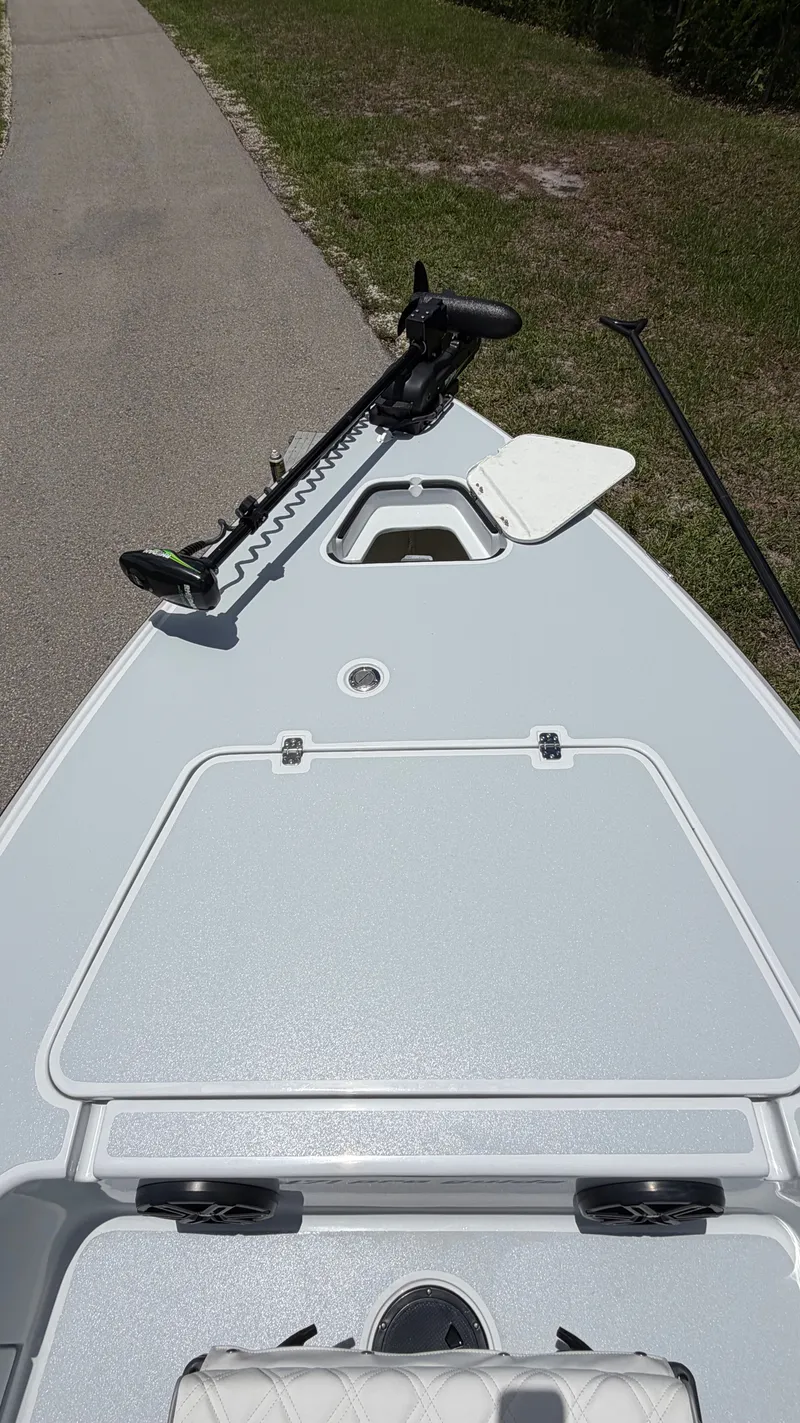 Slide: The Image of 1997 Back Country 171 Pro Guide boat deck with motor. - 18