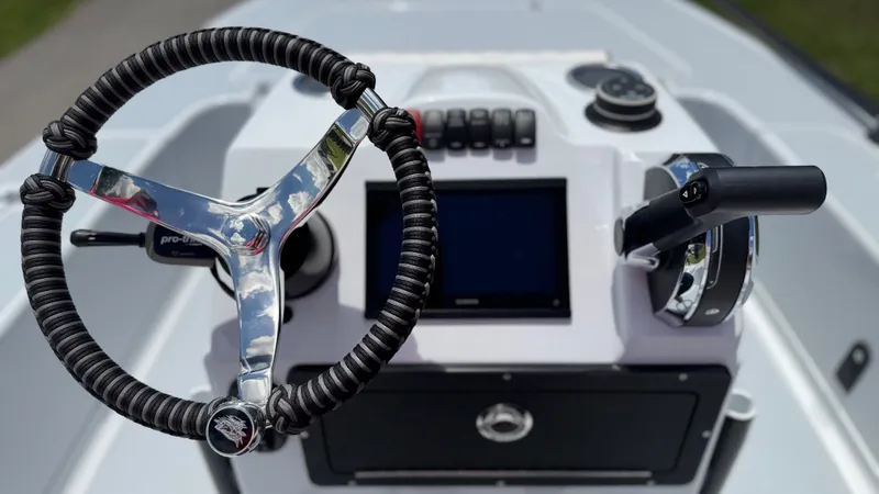 Slide: The Image of Steering console of a 1997 Back Country 171 Pro Guide boat. - 6