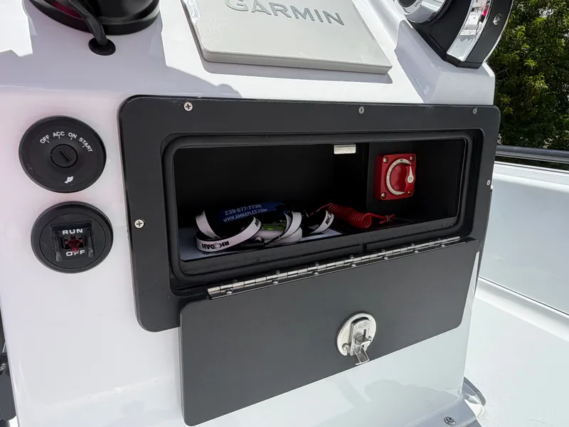 Slide: The Image of Dashboard of a 1997 Back Country 171 Pro Guide boat with Garmin device. - 8