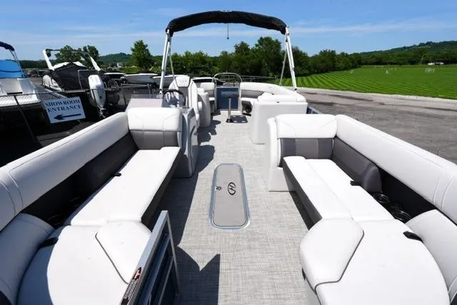 Slide: The Image of 2023 Harris Cruiser 230 CW pontoon boat with spacious seating and modern design. - 8