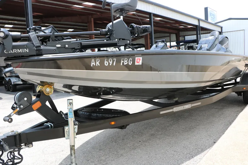 Slide: The Image of 2019 Vexus AVX 1980 boat on trailer, featuring Garmin equipment, parked outdoors. - 11