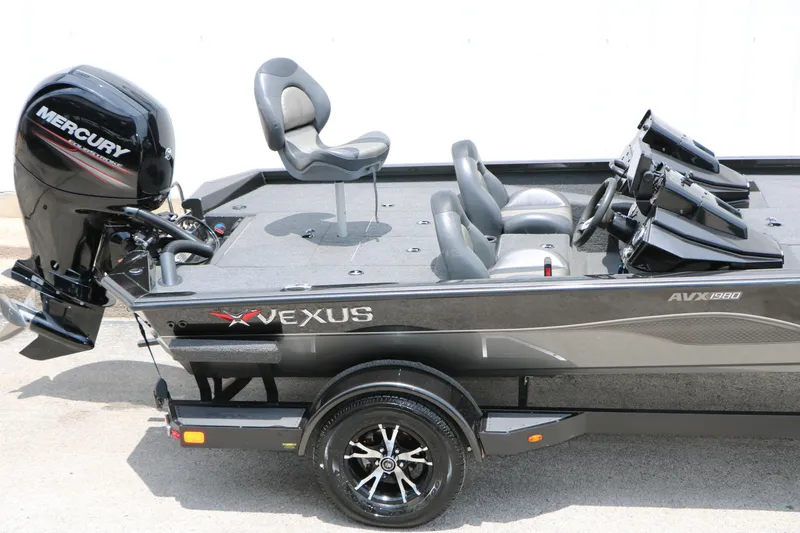 Slide: The Image of 2019 Vexus AVX 1980 boat with Mercury engine, featuring sleek design and comfortable seating. - 13