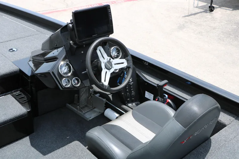 Slide: The Image of 2019 Vexus AVX 1980 boat cockpit with steering wheel and control panel. - 18